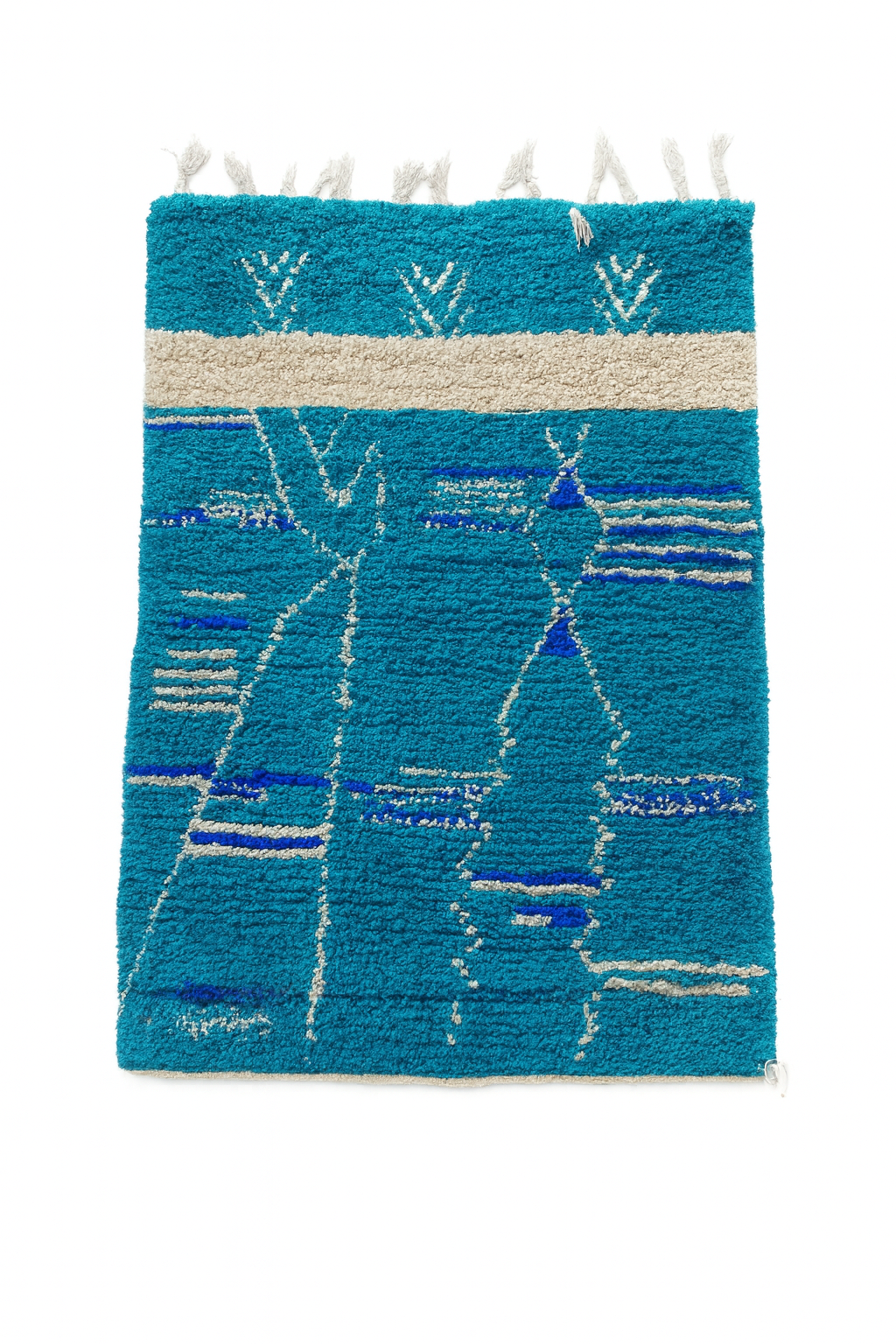 Handwoven Beni Ourain mini rug in deep blue and ivory with flowing Berber horizon motifs.