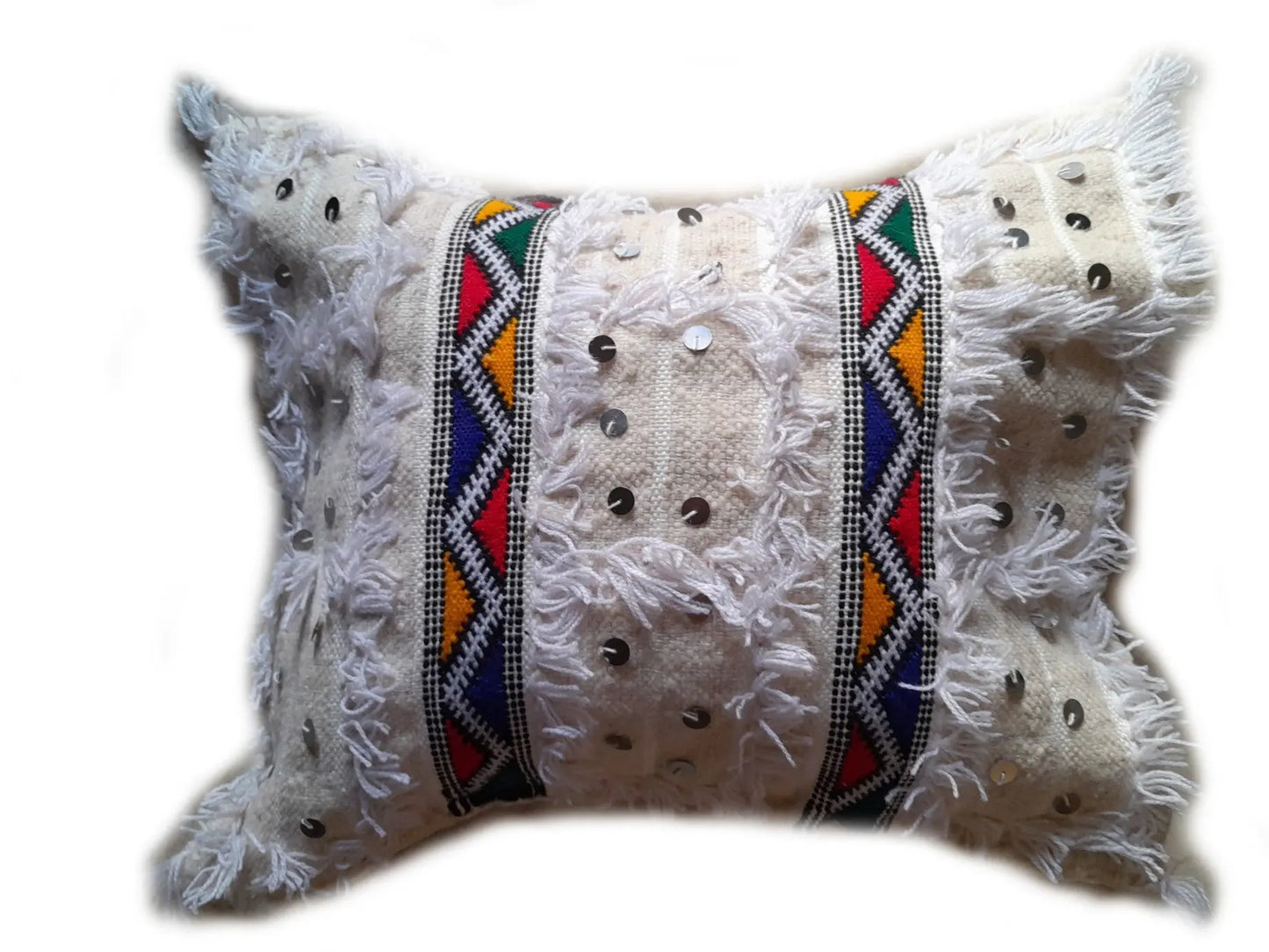 White Moroccan Handira pillow cover with colorful Berber embroidery, fringe texture, and silver sequins, handmade from wool and cotton