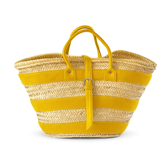 Handwoven Moroccan basket with yellow suede accents and buckle strap — Amber Ridge Basket by Agafay Souk.
