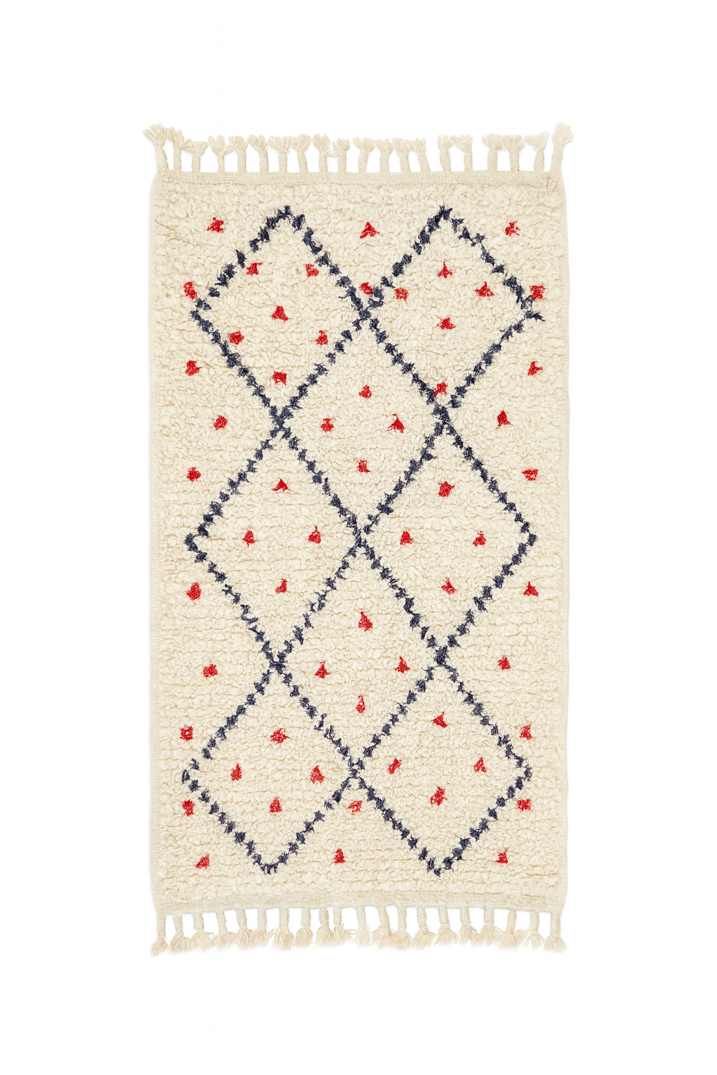 Handwoven Beni Ourain mini rug with ivory base, navy diamond lattice, and red dotted motifs.
