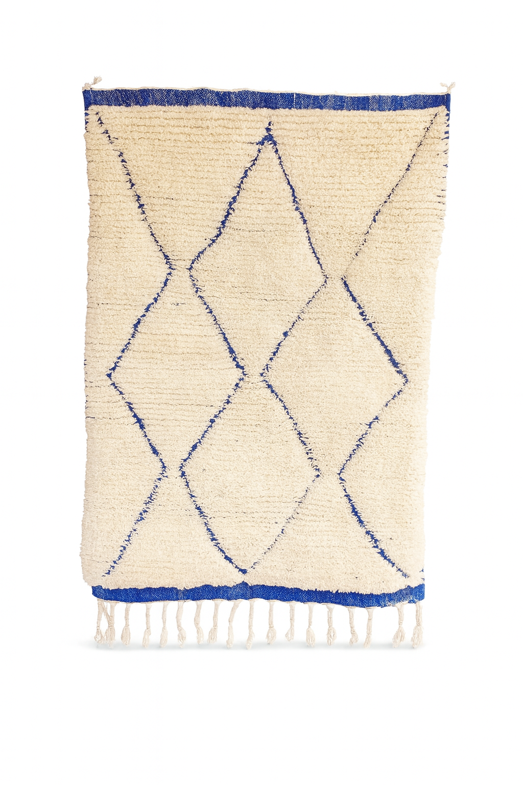 Handwoven Beni Ourain mini rug with ivory base and blue diamond pattern.