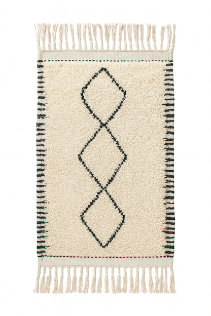 Handwoven Beni Ourain mini rug with ivory wool base, black diamond motifs, and striped borders.
