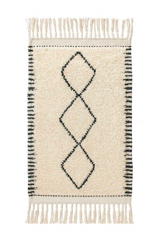 Handwoven Beni Ourain mini rug with ivory wool base, black diamond motifs, and striped borders.
