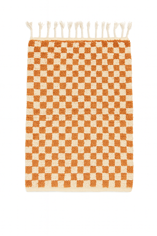 Beni Ourain mini rug in natural ivory wool with warm sandstone grid pattern, handwoven in Morocco.
