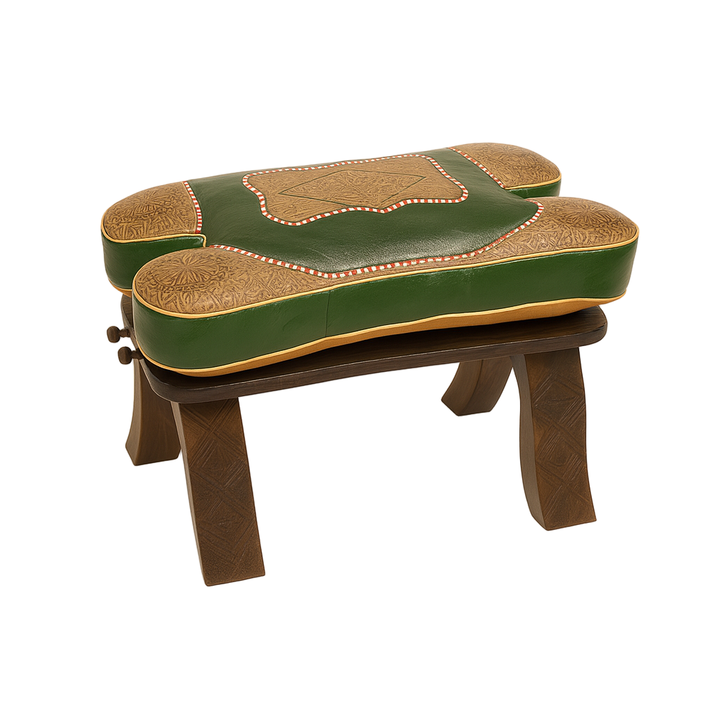Moroccan stool with emerald green embossed leather cushion, gold details, and dark carved wooden legs, handcrafted by artisans in Morocco.
