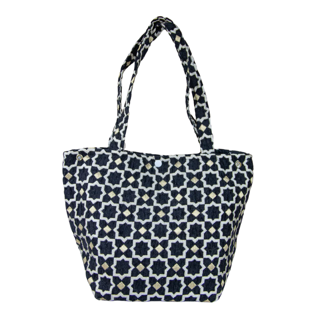 Tote bag with black and white geometric pattern on a beige background