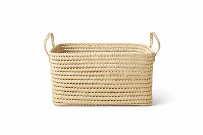 Woven basket with handles on a white background