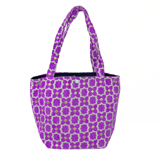 Purple patterned tote bag on a white background