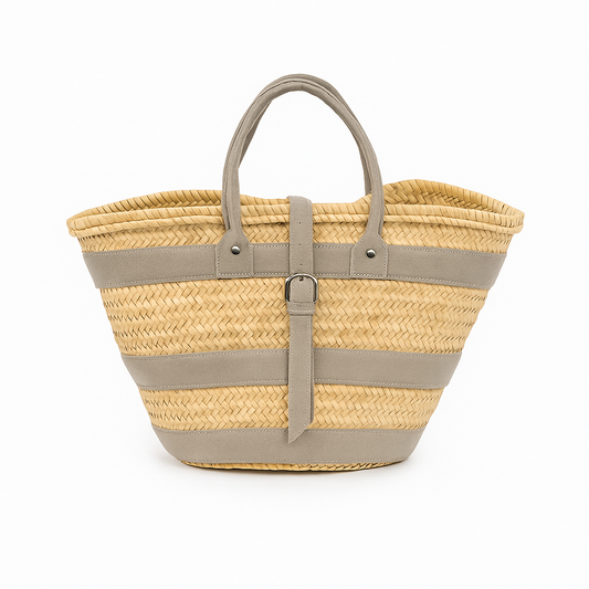Stone Medina Basket — natural palm weave with taupe leather straps and buckle, artisan-made in Morocco
